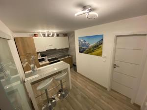Kuchyňa alebo kuchynka v ubytovaní Apartman Bilivano
