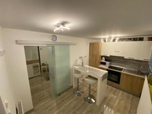 Kuchyňa alebo kuchynka v ubytovaní Apartman Bilivano