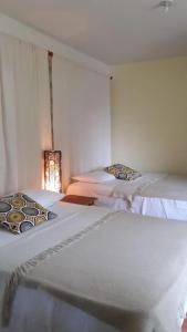 Postel nebo postele na pokoji v ubytování Hotel Magic Tropical