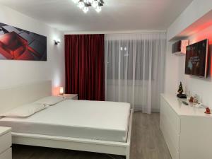 Ένα ή περισσότερα κρεβάτια σε δωμάτιο στο Mery Apartment