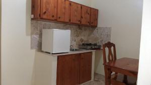 Kuchyň nebo kuchyňský kout v ubytování Hotel Magic Tropical