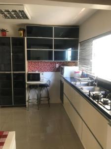 Una cocina o zona de cocina en Apartamento com vista!