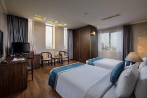 Postel nebo postele na pokoji v ubytování Danly Hotel + 31 fotografií