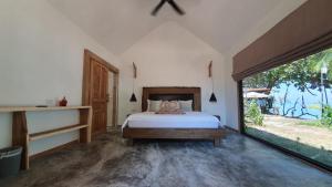 Postel nebo postele na pokoji v ubytování KALUME' Eco Boutique Resort-Adult only