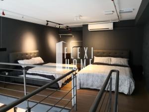 Ένα ή περισσότερα κρεβάτια σε δωμάτιο στο NETFLIX-Pinnacle PJ, Fantastic City View, 1-6 Guests Designed Duplex Home by Flexihome-MY