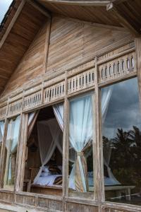 Balkón nebo terasa v ubytování Kidem Ubud Villas