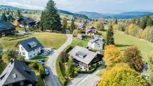 an aerial view of a residential neighborhood with houses at stuub windeck in Hinterzarten