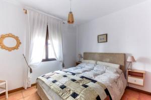 Ένα ή περισσότερα κρεβάτια σε δωμάτιο στο CONIL CENTRO PLAYA