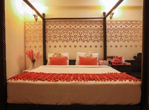 Laxmi Palace Heritage Boutique Hotel客房内的一张或多张床位