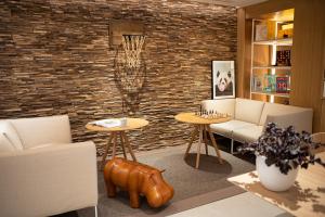 a room with a basketball hoop on a brick wall at INNSiDE by Meliá Zaragoza in Zaragoza