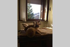 Posteľ alebo postele v izbe v ubytovaní Maison des Alpes mansarda