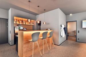 Kuchyň nebo kuchyňský kout v ubytování Warth52-W52 Apartments