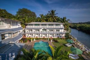 Bazén v ubytování Stone Wood Riverfront Resort, Siolim nebo v jeho okolí