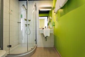 Phòng tắm tại harry's home Linz-Urfahr hotel & apartments
