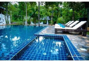 Piscina a Serendib Signature Resort o a prop