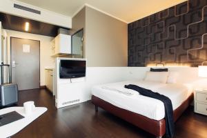 TV/trung tâm giải trí tại harry's home Linz-Urfahr hotel & apartments