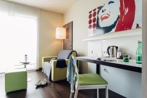 Khu vực ghế ngồi tại harry's home Linz-Urfahr hotel & apartments