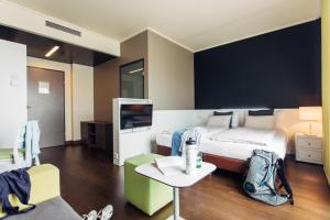 Khu vực ghế ngồi tại harry's home Linz-Urfahr hotel & apartments