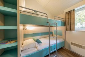 Postel nebo postele na pokoji v ubytování Center Parcs Les Ardennes