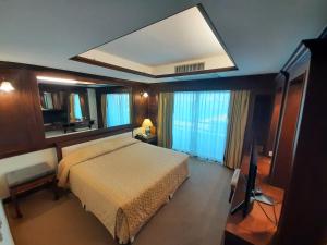 Кровать или кровати в номере Grand Hotel