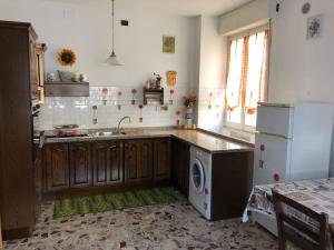 A kitchen or kitchenette at Casa Pipetta