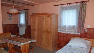 Postel nebo postele na pokoji v ubytování osada yukon