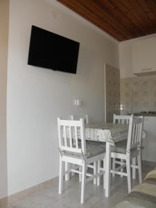 TV a/nebo společenská místnost v ubytování Apartmani Adam
