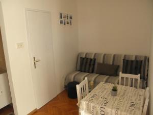 Postel nebo postele na pokoji v ubytování Apartmani Adam