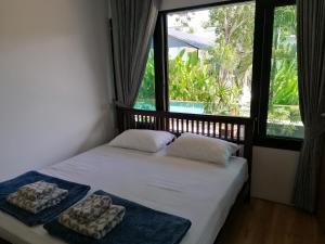 Кровать или кровати в номере Twin Villa