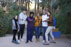 a group of people posing for a picture at Ecolodge du Draa in Ouled Otmane