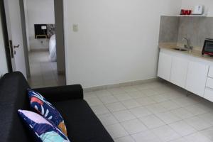 Μια τηλεόραση ή/και κέντρο ψυχαγωγίας στο Luminoso a dos cuadras de la plaza