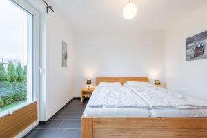 Postel nebo postele na pokoji v ubytování Haus Calmsailing