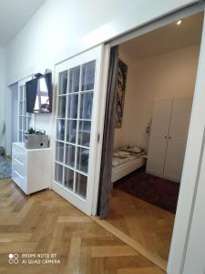 Postel nebo postele na pokoji v ubytování Apartment Zrinjevac
