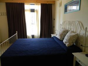 Postel nebo postele na pokoji v ubytování B&B Corte Preare