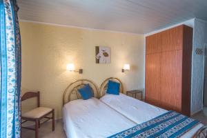 Postel nebo postele na pokoji v ubytování Kommeno Bay Apartments