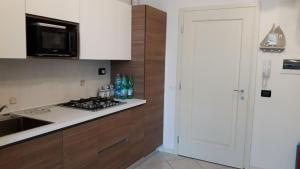 Kuchyň nebo kuchyňský kout v ubytování Delle Rose apartment
