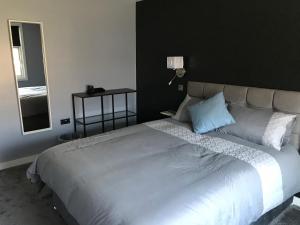 Postel nebo postele na pokoji v ubytování Cozy Rooms