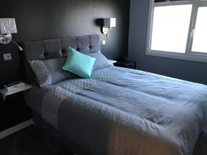 Postel nebo postele na pokoji v ubytování Cozy Rooms