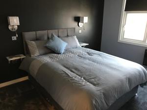 Postel nebo postele na pokoji v ubytování Cozy Rooms