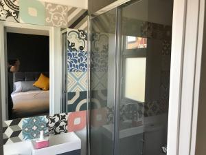 Postel nebo postele na pokoji v ubytování Cozy Rooms