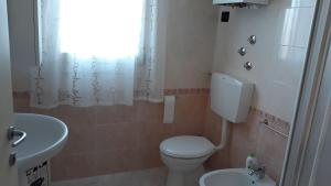 Koupelna v ubytování Delle Rose apartment + 25 fotografií