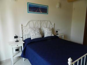 Postel nebo postele na pokoji v ubytování B&B Corte Preare