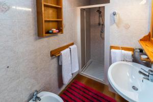 Koupelna v ubytování Casa dal Ri'