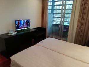 TV/Unterhaltungsangebot in der Unterkunft Hotel Vila Luena