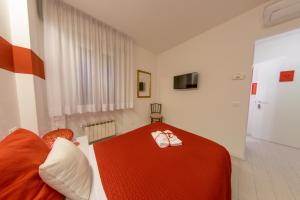 Postel nebo postele na pokoji v ubytování Marconi Rooms 1, 2, 3 Casa Stella