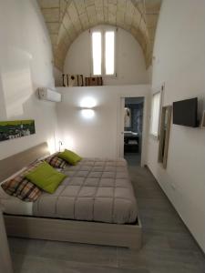 Llit o llits en una habitació de Casa da Giacomo (barocco)