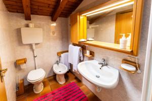 Koupelna v ubytování Casa dal Ri'