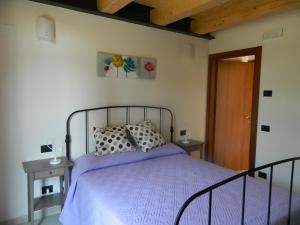 Postel nebo postele na pokoji v ubytování B&B Corte Preare