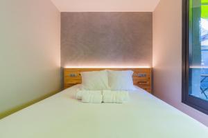 Łóżko lub łóżka w pokoju w obiekcie Ok Hostel Madrid