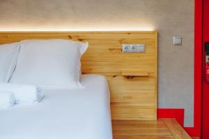 Łóżko lub łóżka w pokoju w obiekcie Ok Hostel Madrid
